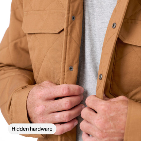 Hidden snap front closure on the Berne Quilted Water Repellent Shirt Jacket in Brown