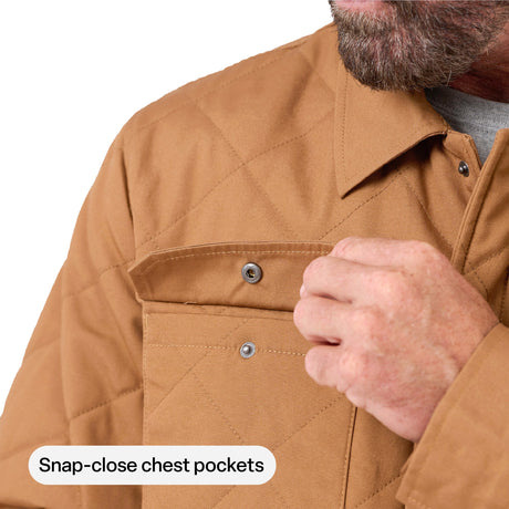 Snap-close chest pockets on the Berne Quilted Water Repellent Shirt Jacket in Brown